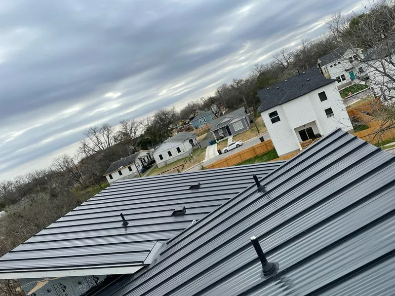Standing seam metal roof panels with vents for Skylight Repair in Scottsboro